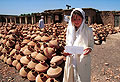 Jemima checking the delivery of clay pitchers for water storage