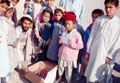 distribution of clothing to children at Shalman refugee camp